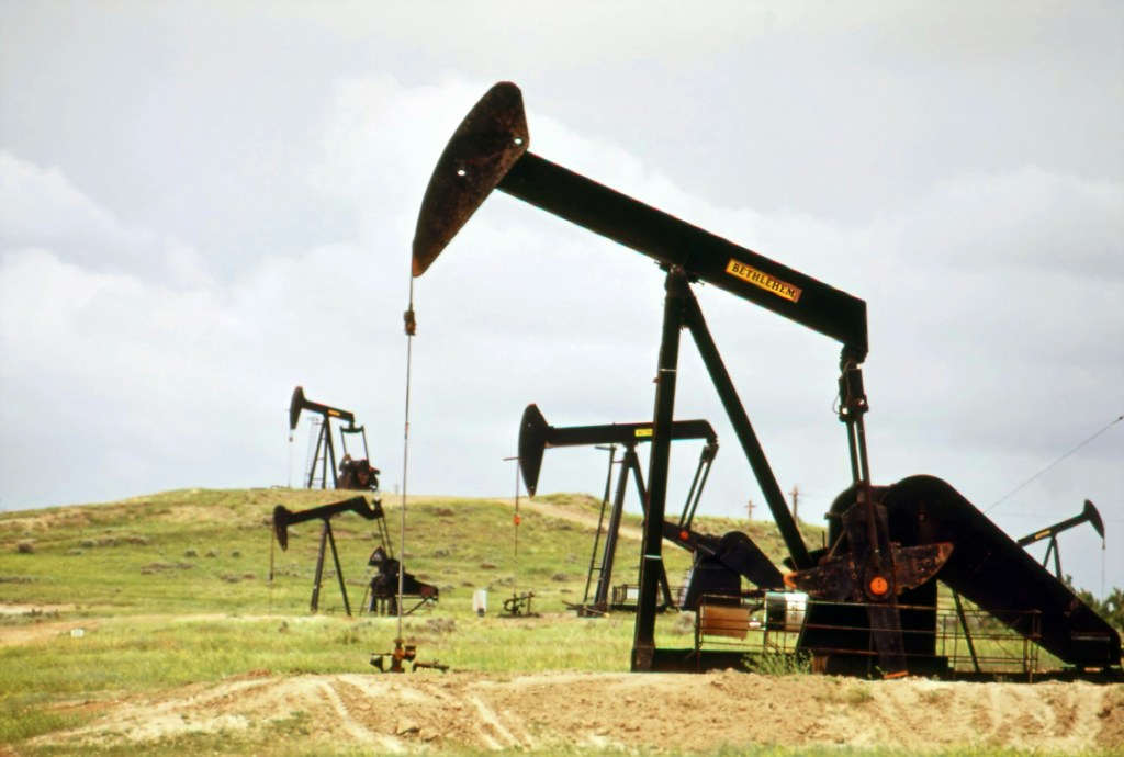 Oil pumpjacks operating in a field